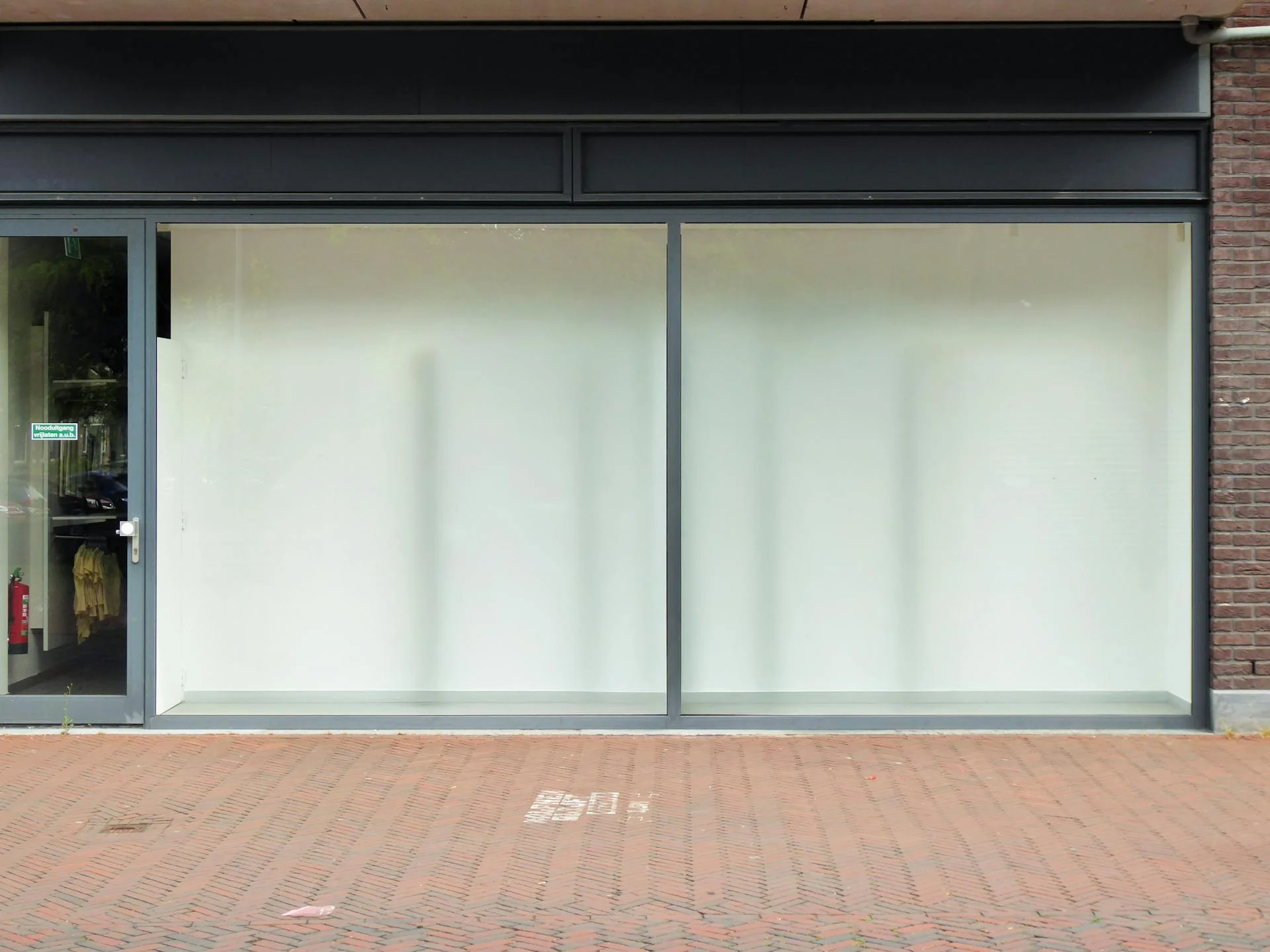 Modern commercial shopfront with large glass panels