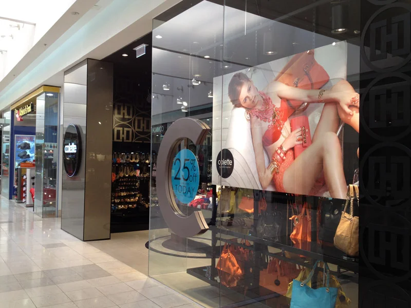 Commercial shopfront glazing with clean framed glass panels