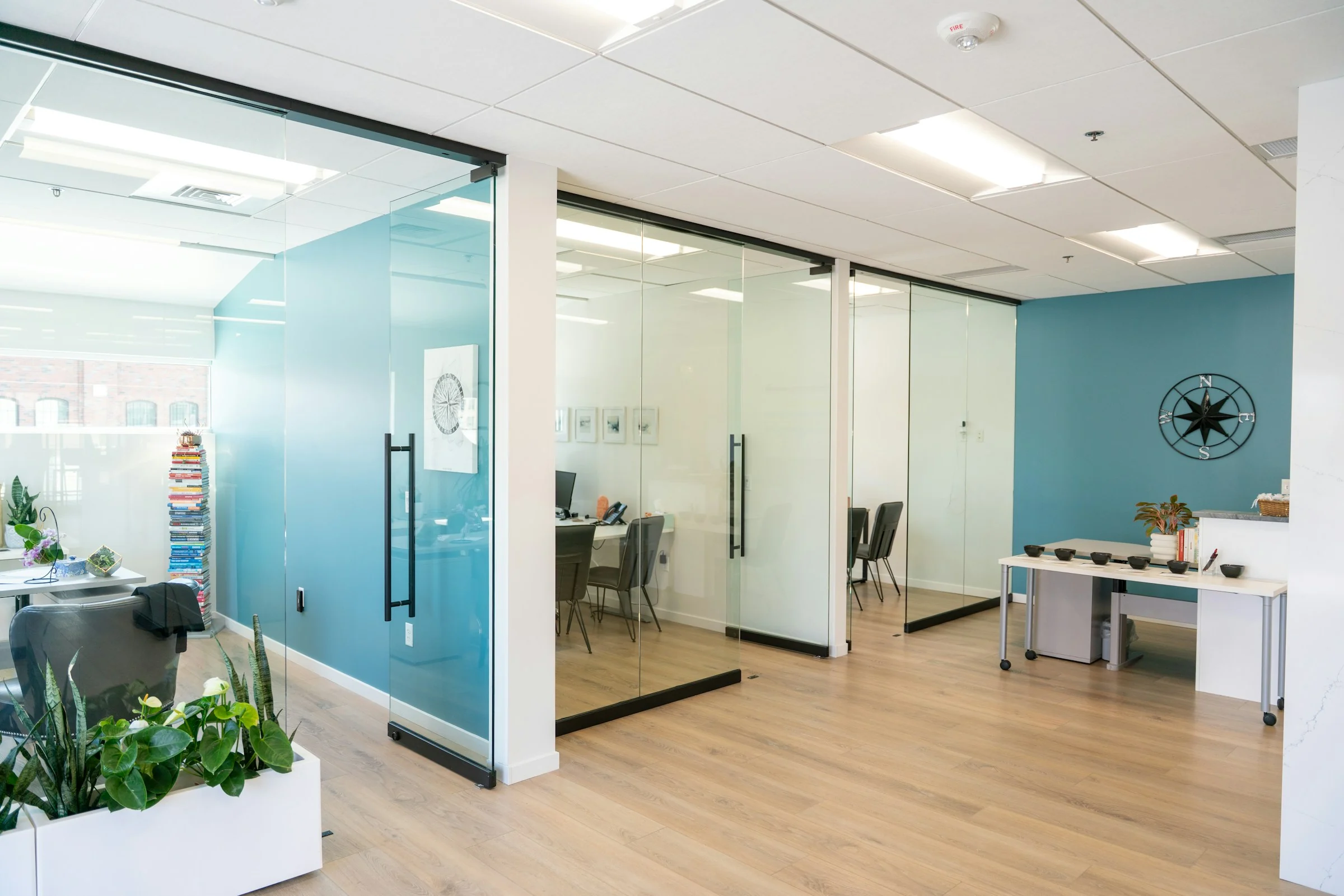 Modern commercial office with floor-to-ceiling glass partitions