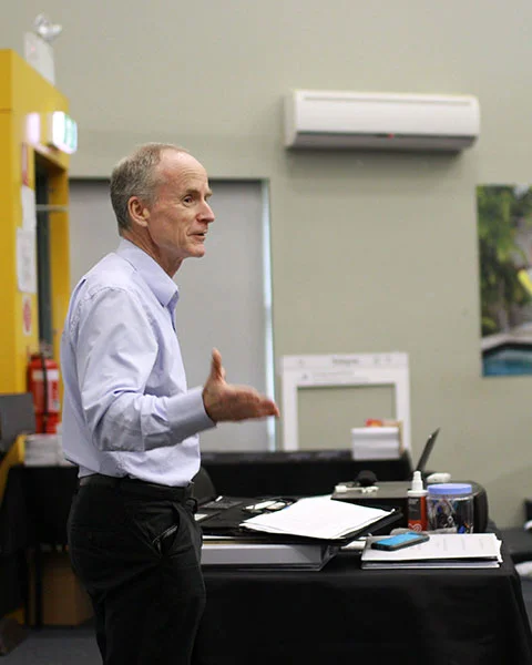 Jim Penman speaking at a Jim's Group event
